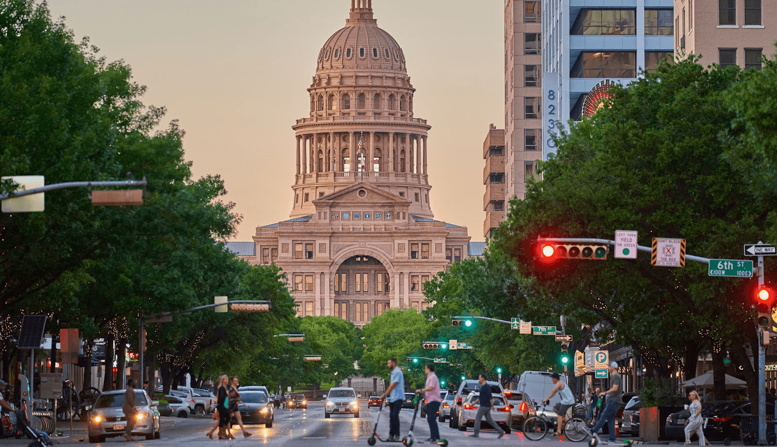 High-angle view of Congress Avenue in Austin, Texas, with the Texas State Capitol visible in the distance